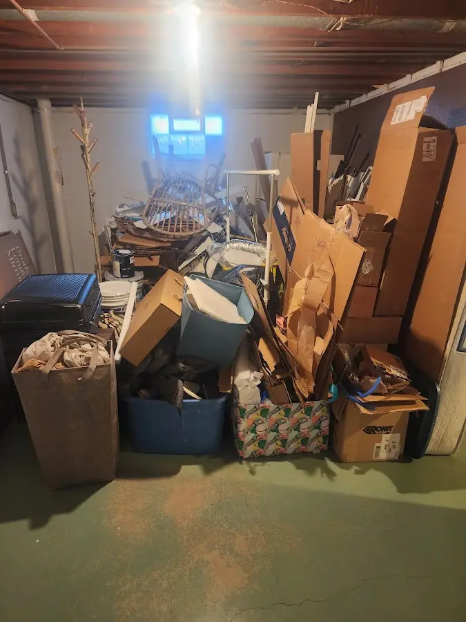 Roll-off dumpster container at job site for 2 Yard Dumpster Rental in Forest Park